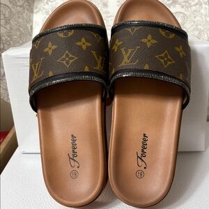 women’s up cycled LV sandals size 6 1/2